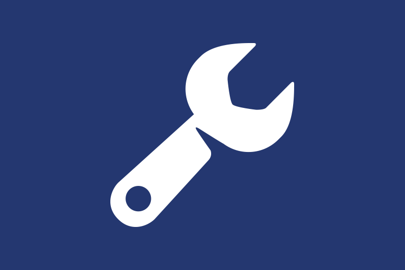 White wrench icon on a blue background