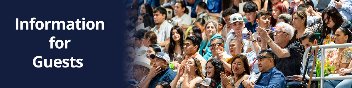 Image of familes and friends cheering for the graduates at the Uvalde County Fairplex.