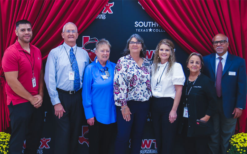 Representatives from Southwest Texas College and San Antonio College pose for a photo at the Allied Health Consortium Celebration at the Uvalde campus.